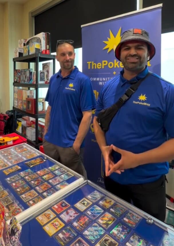 Wes and the team in ThePokeMrkt polos at the Crossroads Market stall